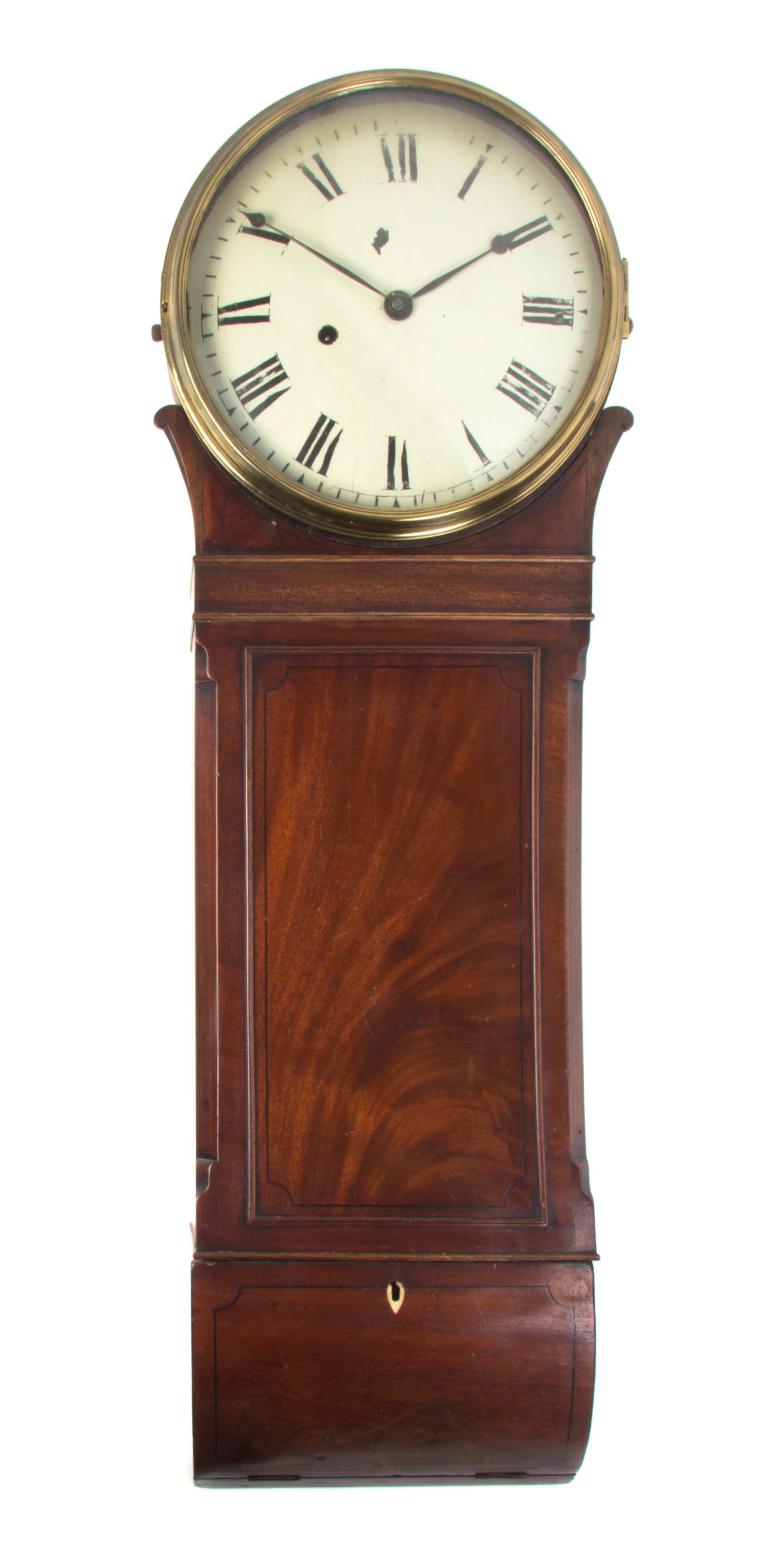 An English Mahogany Wall Clock, Height 39 inches.