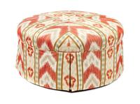 A Modern Ikat Upholstered Ottoman Height 18 x diameter 36 1/2 inches.