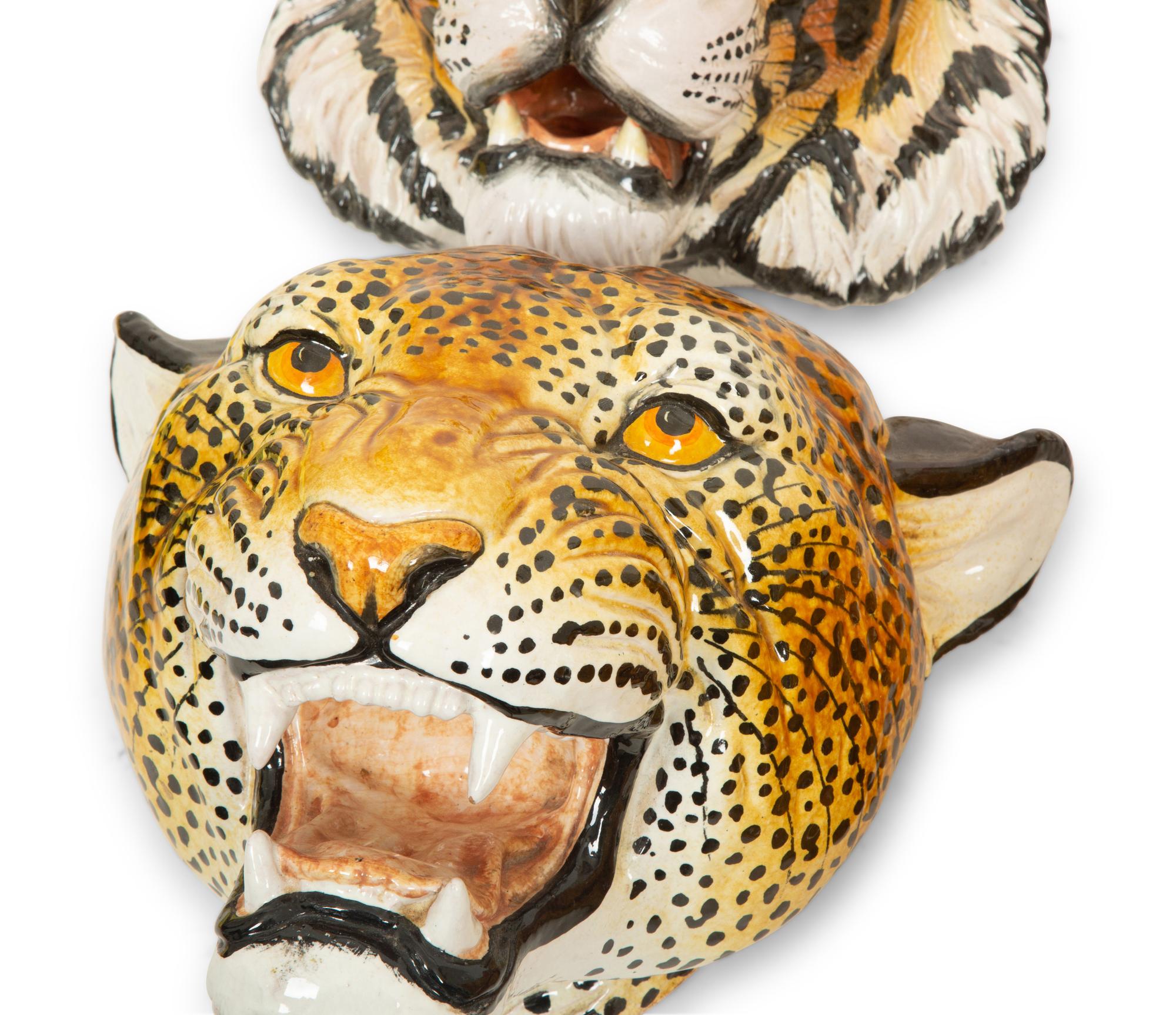 A Group of Six Italian Glazed Terracotta Feline Head Wall Mounts