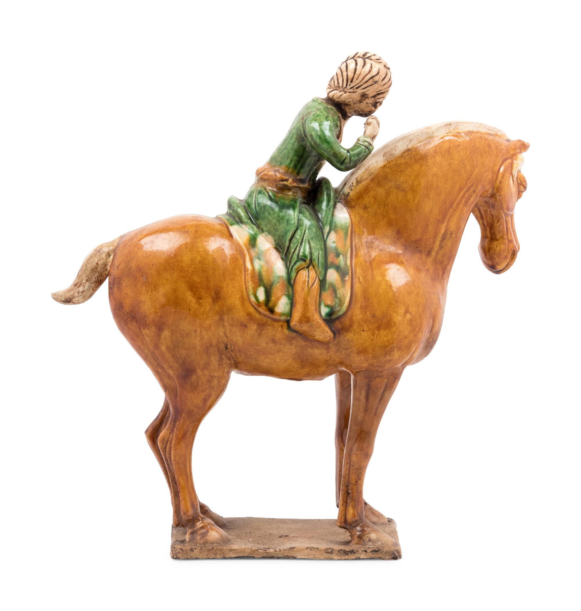 A Chinese Sancai Glazed Burial Figure of a Mounted Attendant