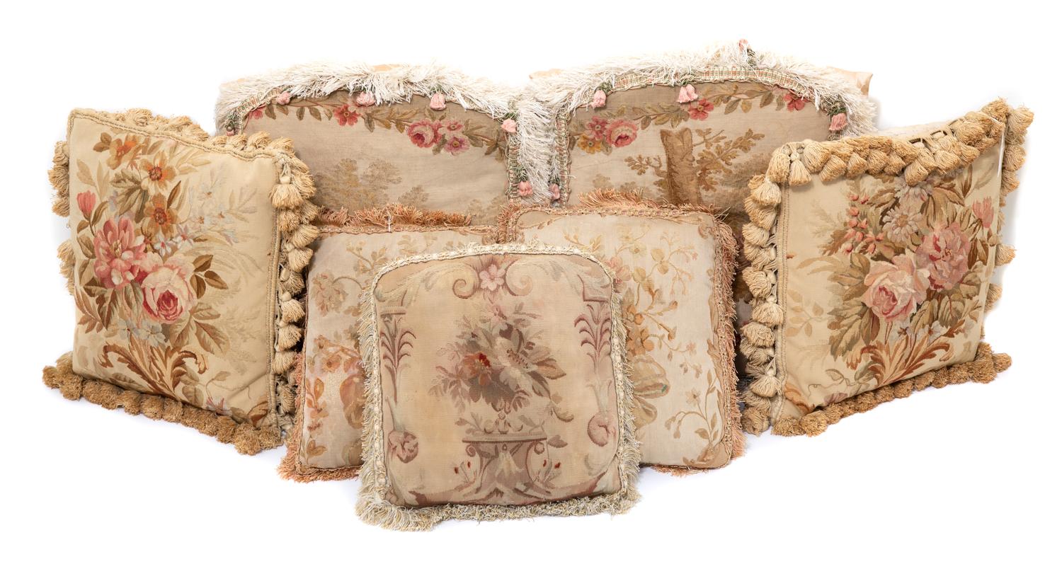A Group of Seven Aubusson Style Needlepoint Pillows Larger, 15 1/2 x 13 inches.