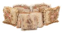 A Group of Seven Aubusson Style Needlepoint Pillows Larger, 15 1/2 x 13 inches.