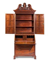 A Chippendale Carved Walnut Desk And Bookcase