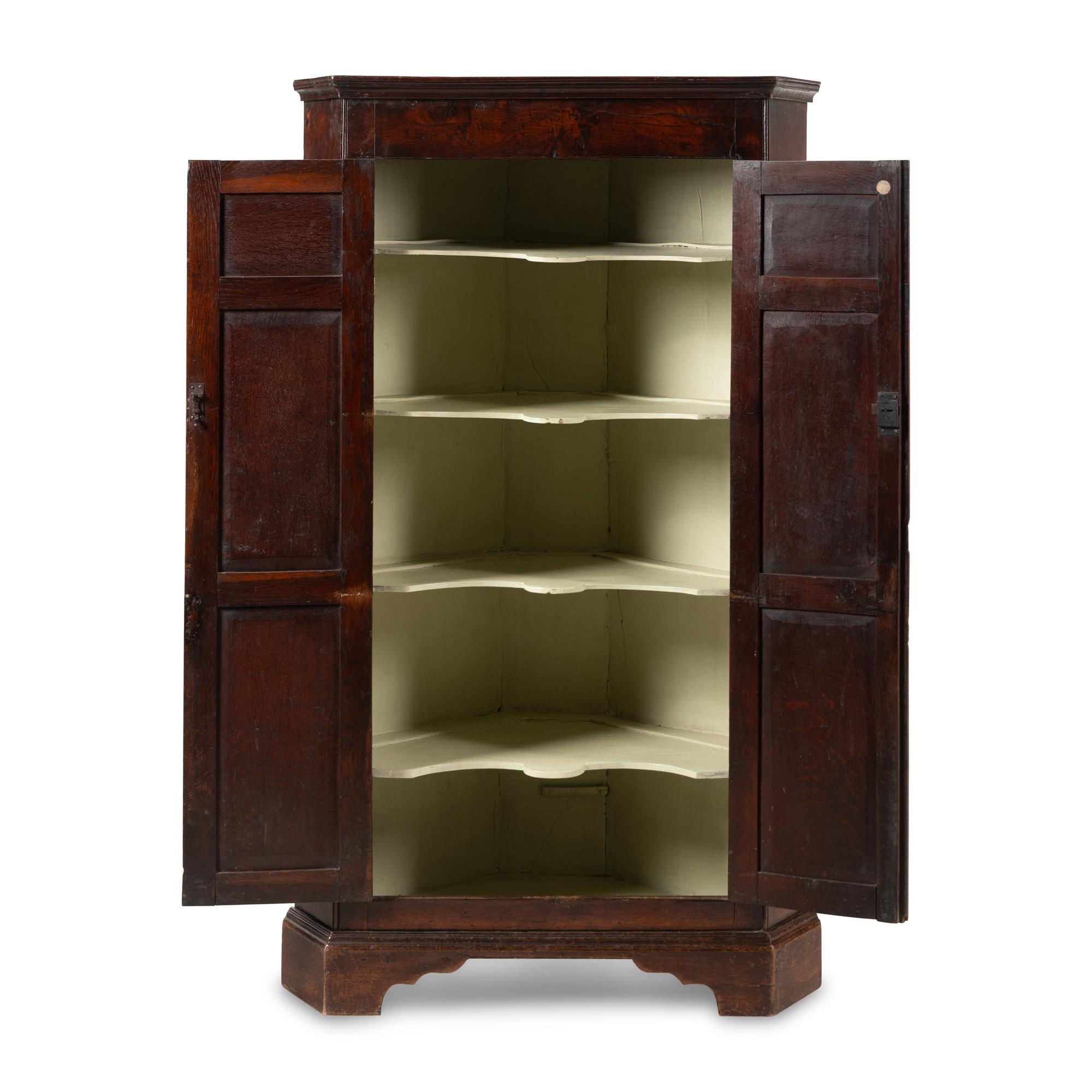 A George III Oak Corner Cabinet