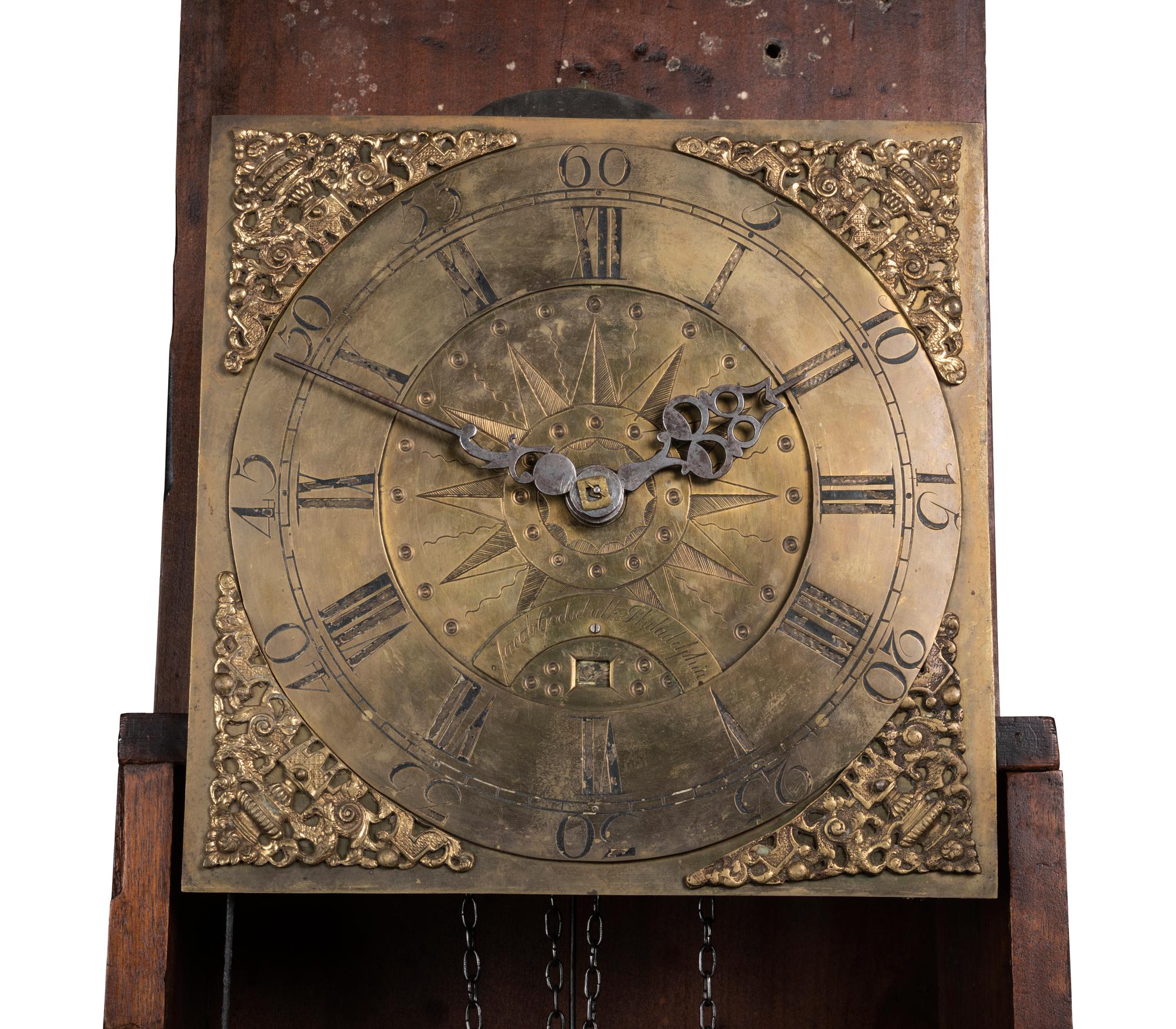 A Queen Anne Walnut Tall Case Clock