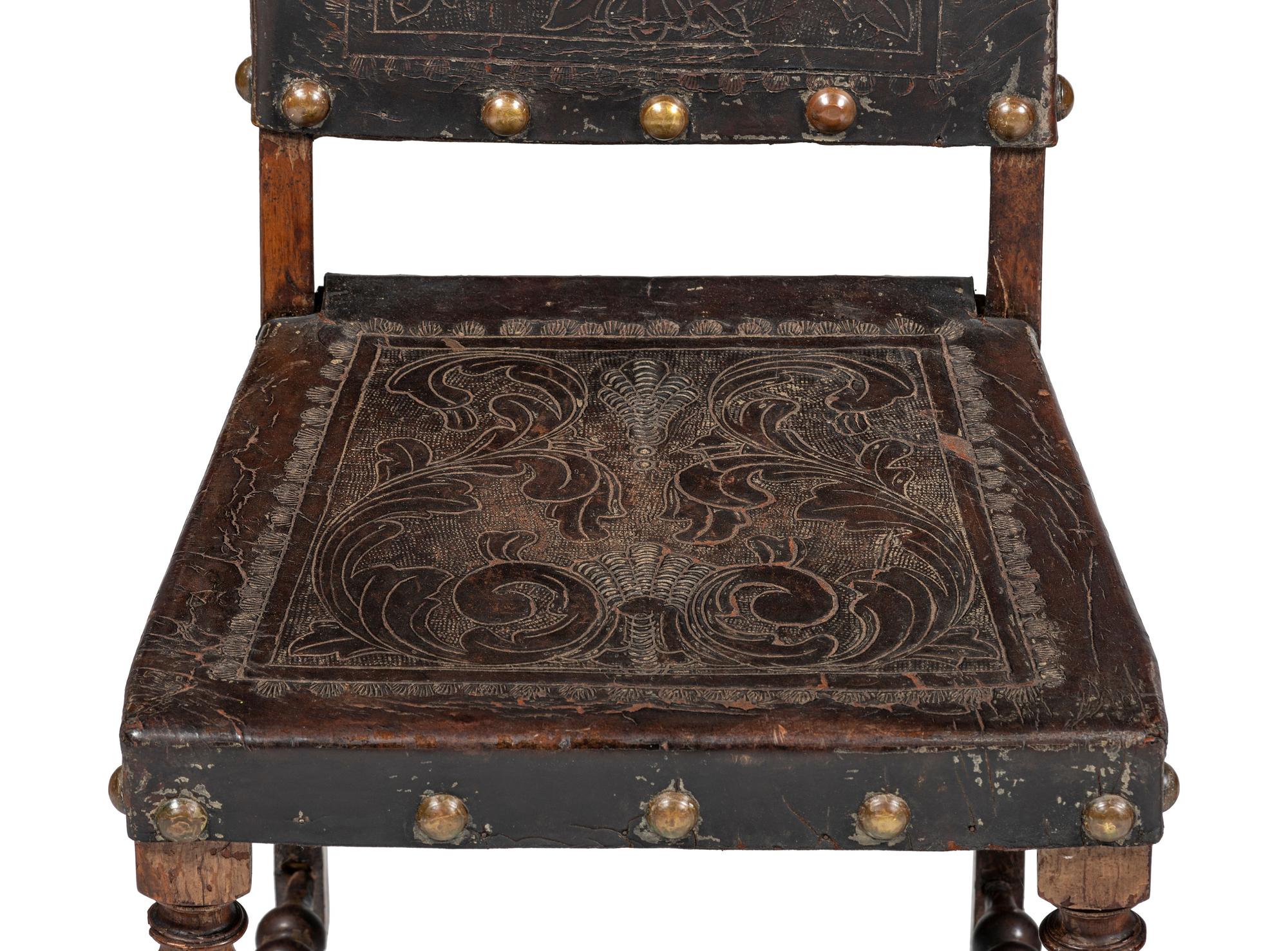 Six Mizner Carved Walnut and Embossed Leather Back Side Chairs
