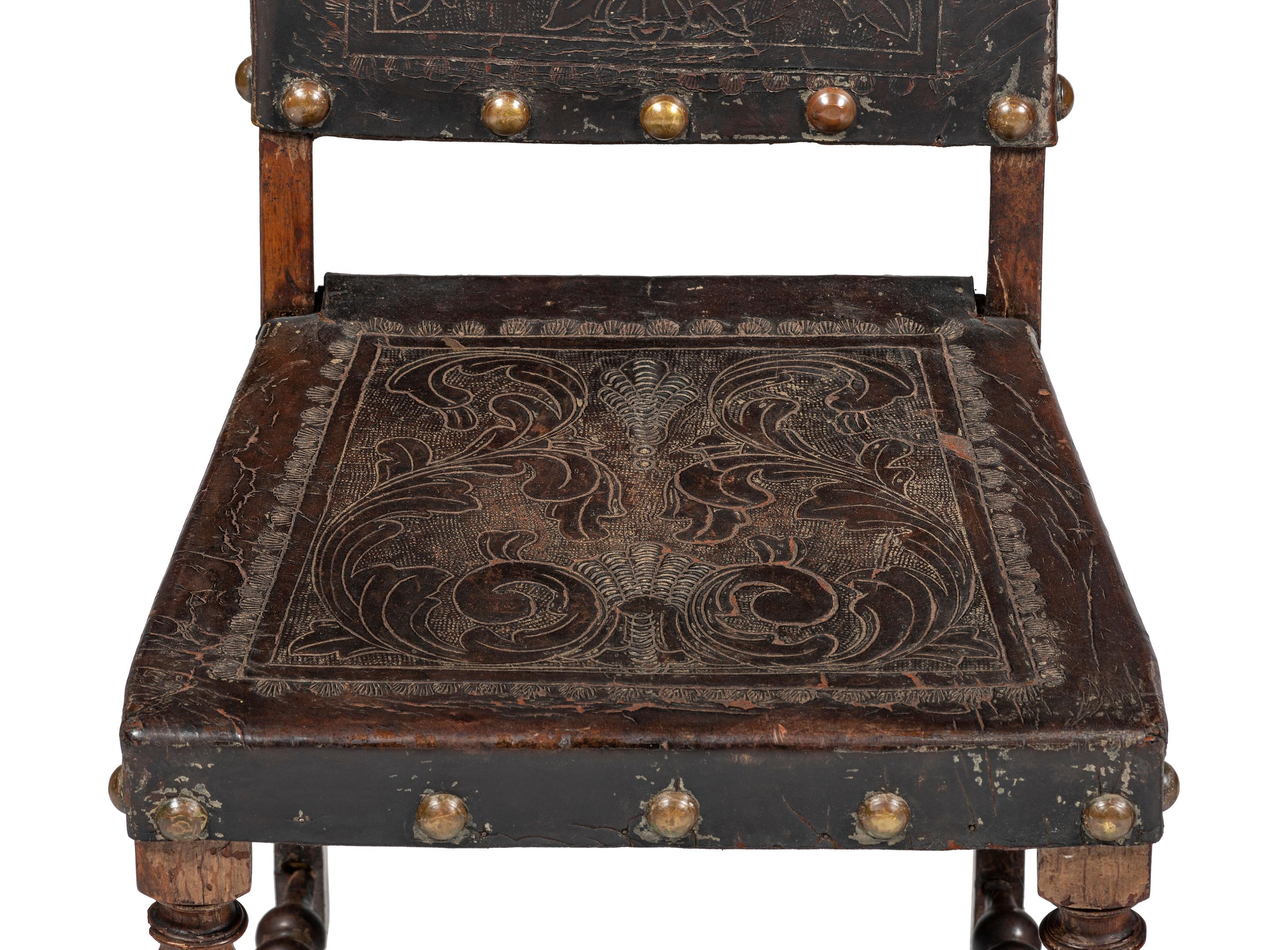 Six Mizner Carved Walnut and Embossed Leather Back Side Chairs