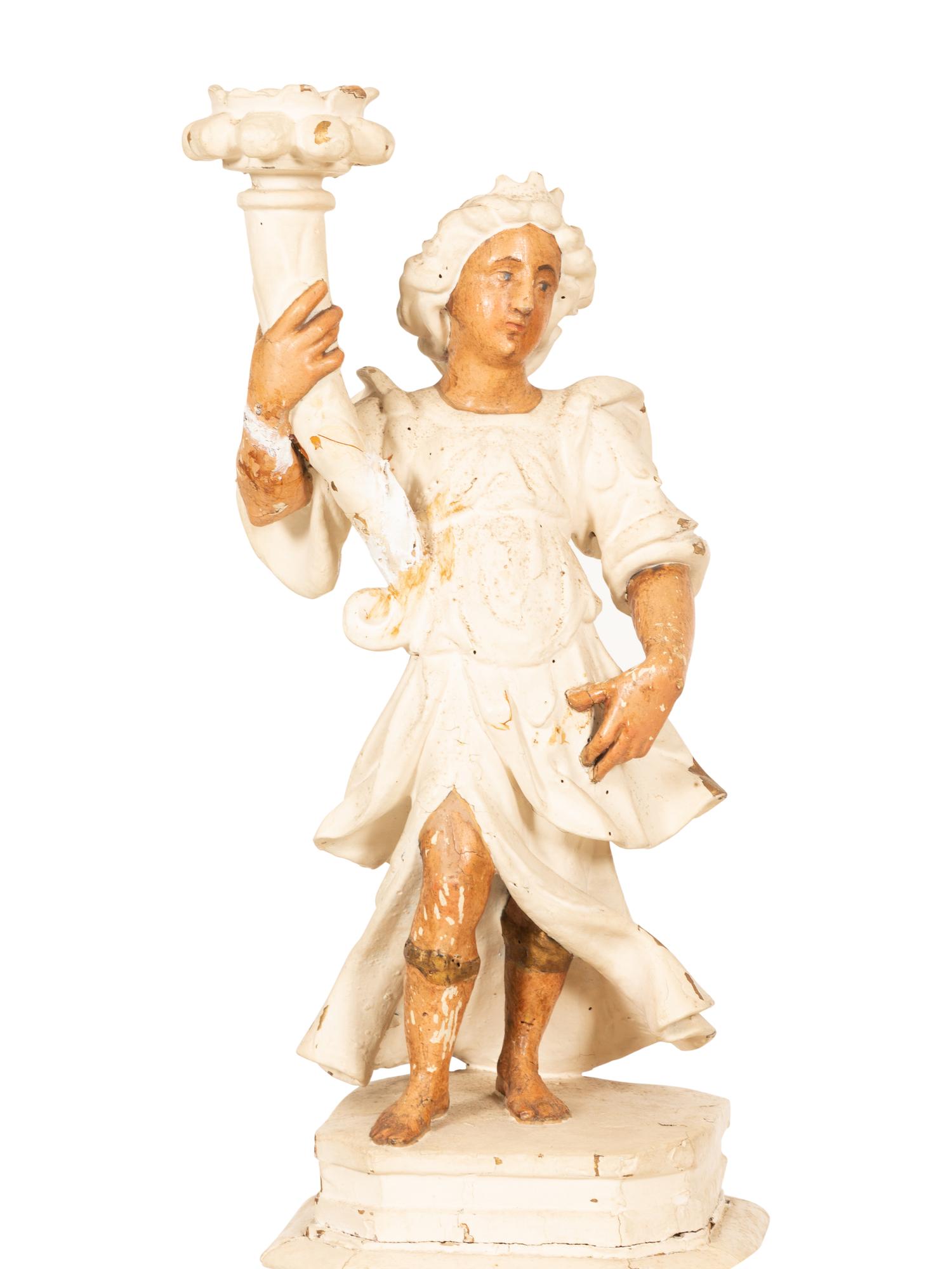 A Pair of Italian Painted Figural Candelsticks on Pedestal Bases