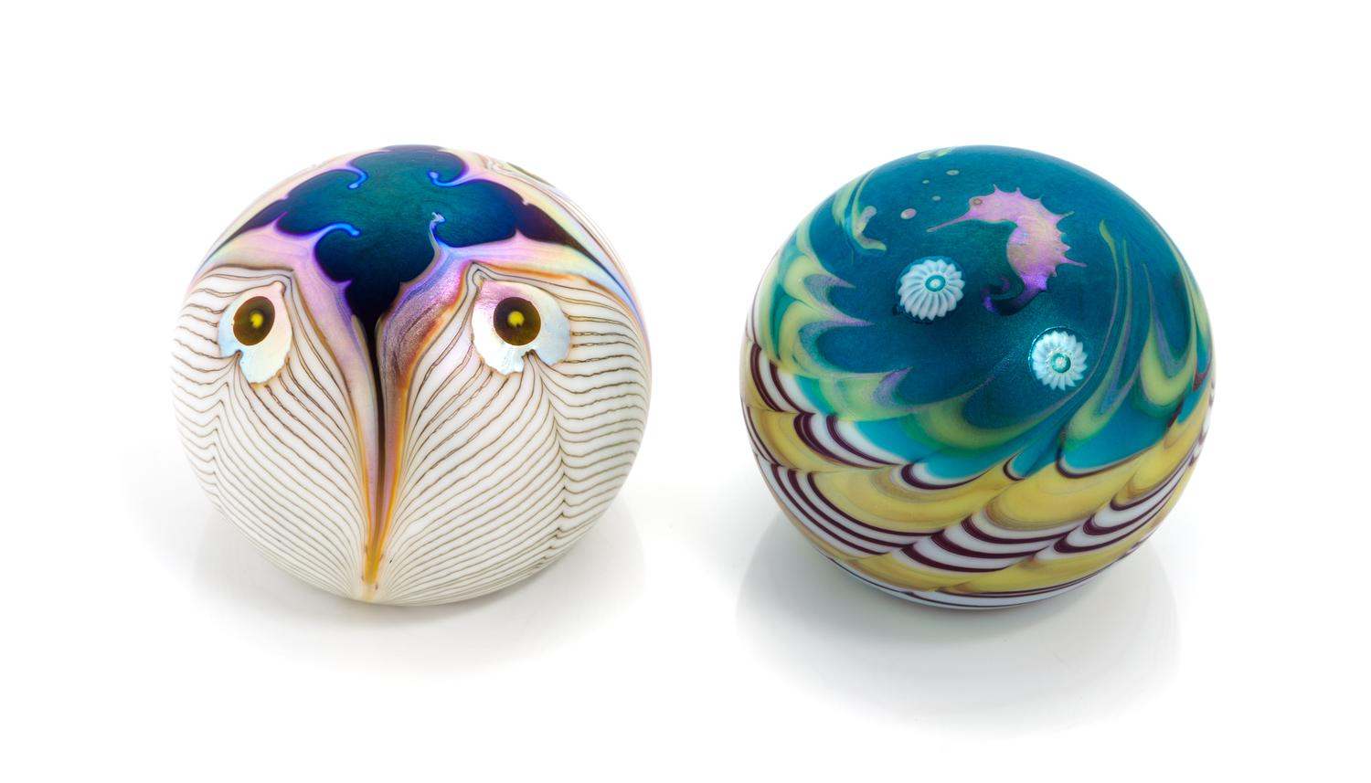 Lundberg Studios, DAVENPORT, CA, 1976; 1977, a group of two glass paperweights