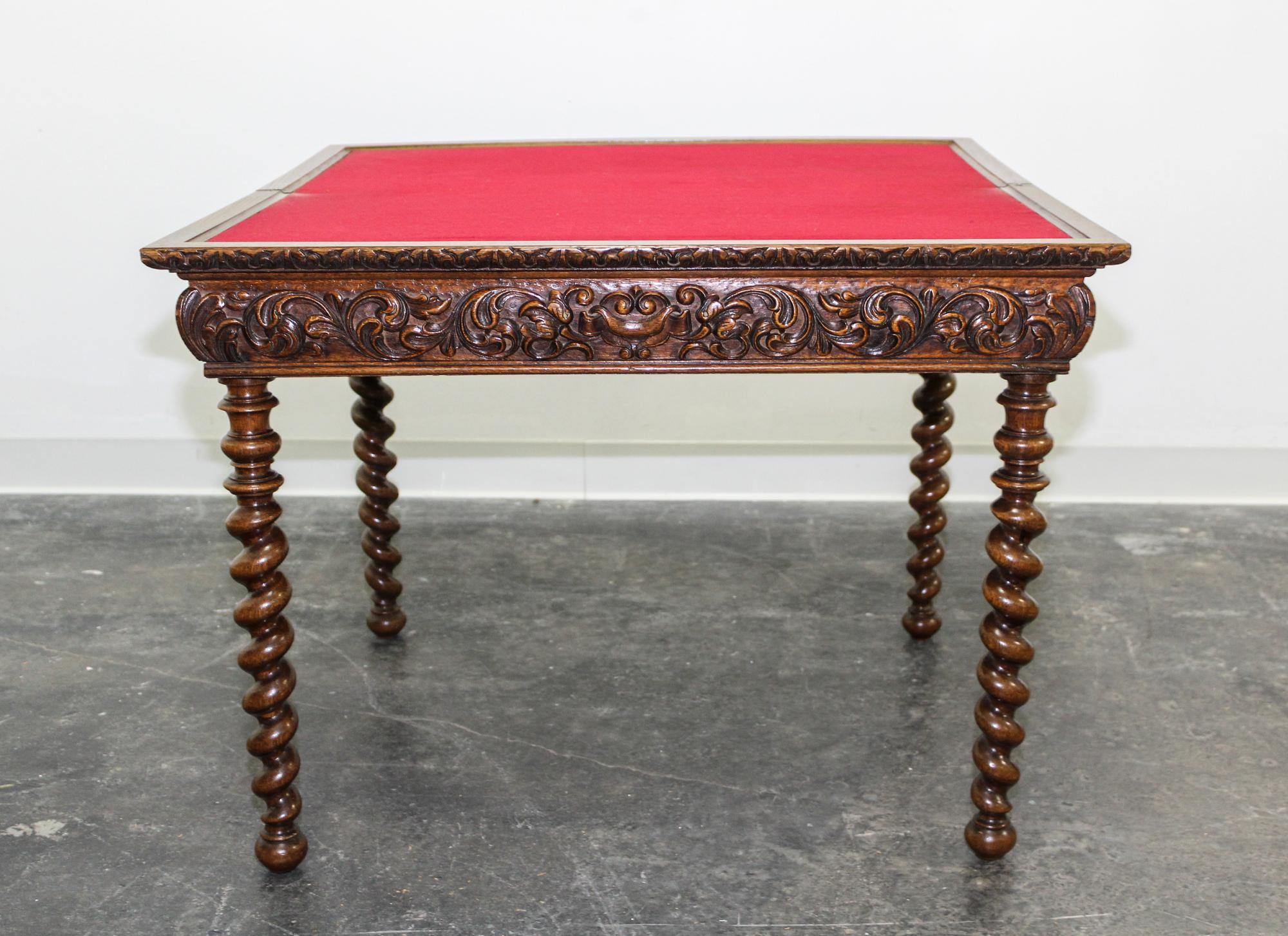 A Jacobean Revival Style Flip Top Games Table. Height 26 1/4 x width 34 1/2 x depth 17 1/4 inches.