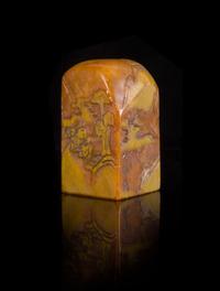 A Carved Yellow Soapstone Seal Height 4 1/4 inches.