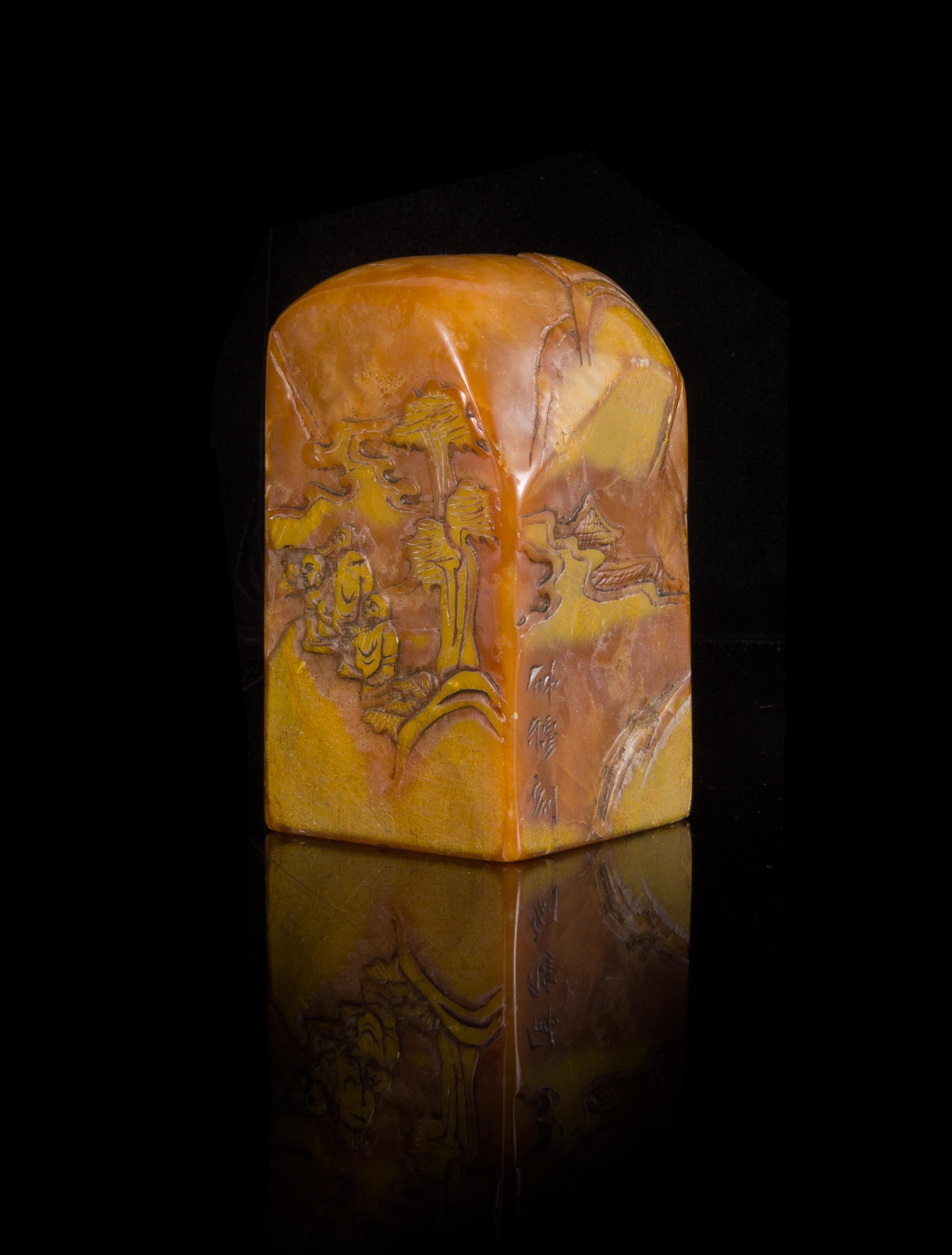 A Carved Yellow Soapstone Seal Height 4 1/4 inches.