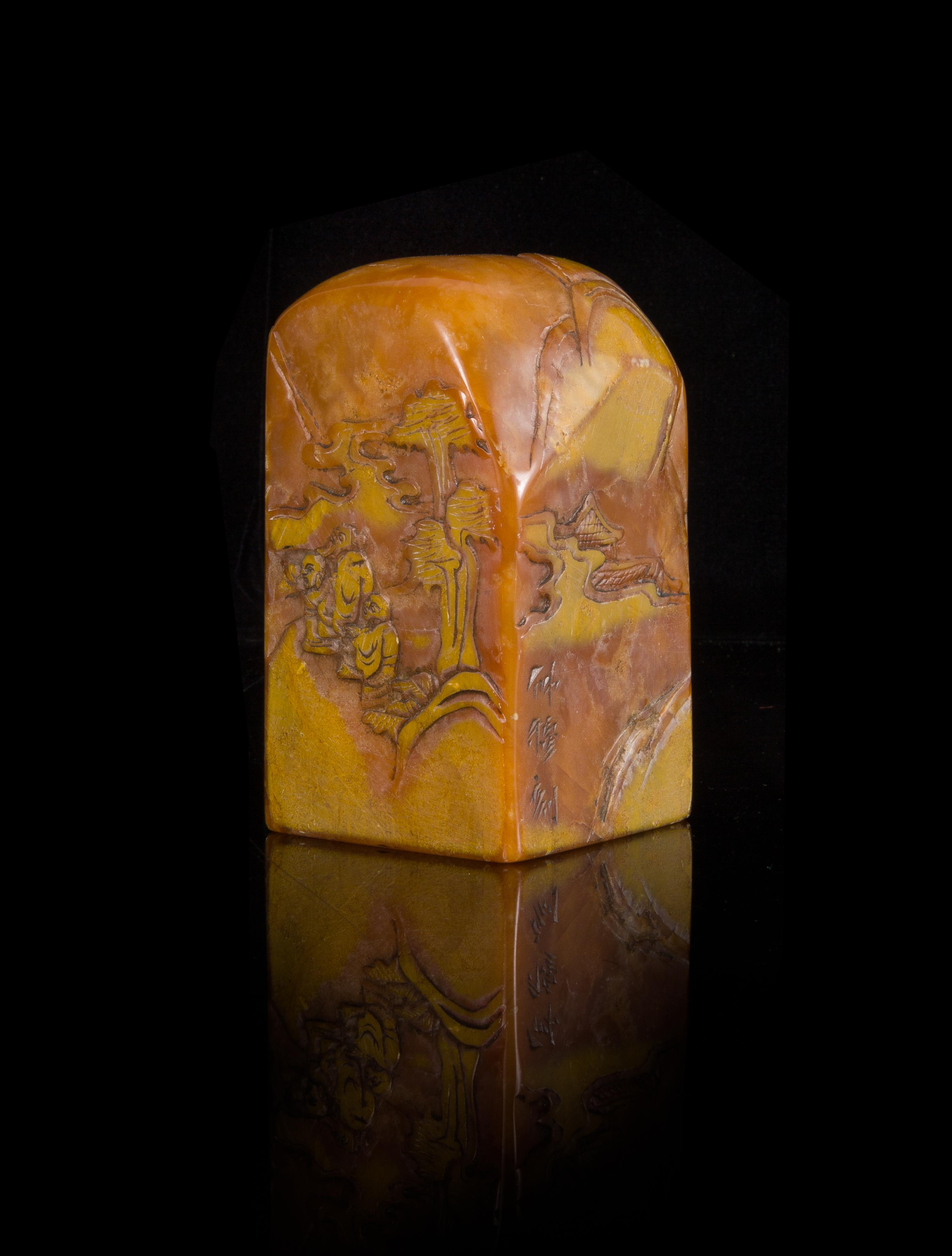 A Carved Yellow Soapstone Seal Height 4 1/4 inches.