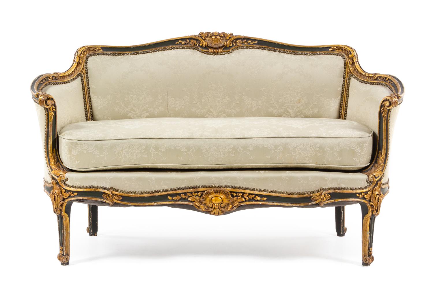 An Italian Painted and Gilt Sofa Height 35 3/4 x width 60 1/2 x depth 26 inches. — LATE 19TH/EARLY 20TH CENTURY