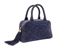 A Chanel Blue Suede Quilted Bowling Bag, 11" x 6.5" x 4.5".