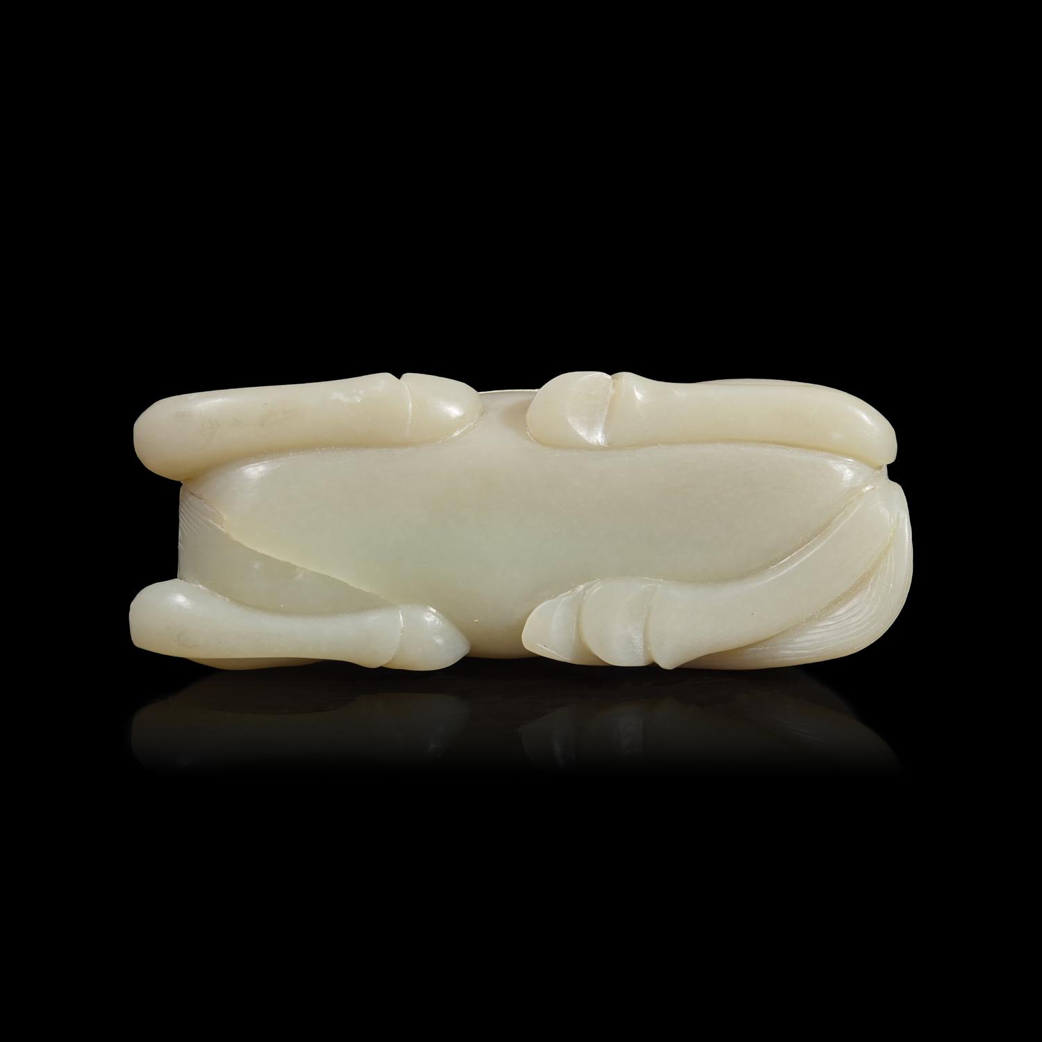 A Chinese Carved Pale Celadon Jade Horse, 20th Century 近代 青白玉臥馬