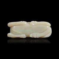 A Chinese Carved Pale Celadon Jade Horse, 20th Century 近代 青白玉臥馬