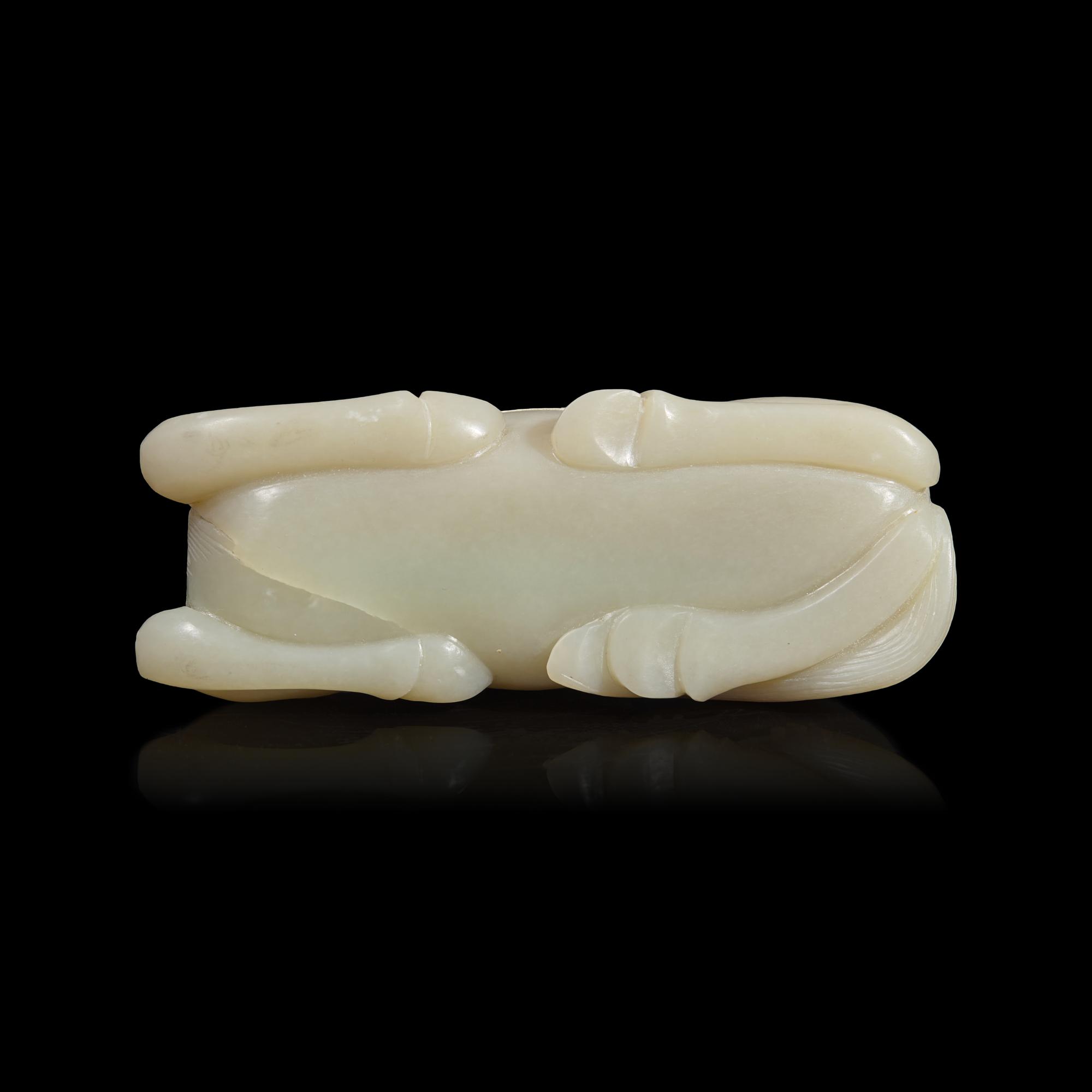 A Chinese Carved Pale Celadon Jade Horse, 20th Century 近代 青白玉臥馬