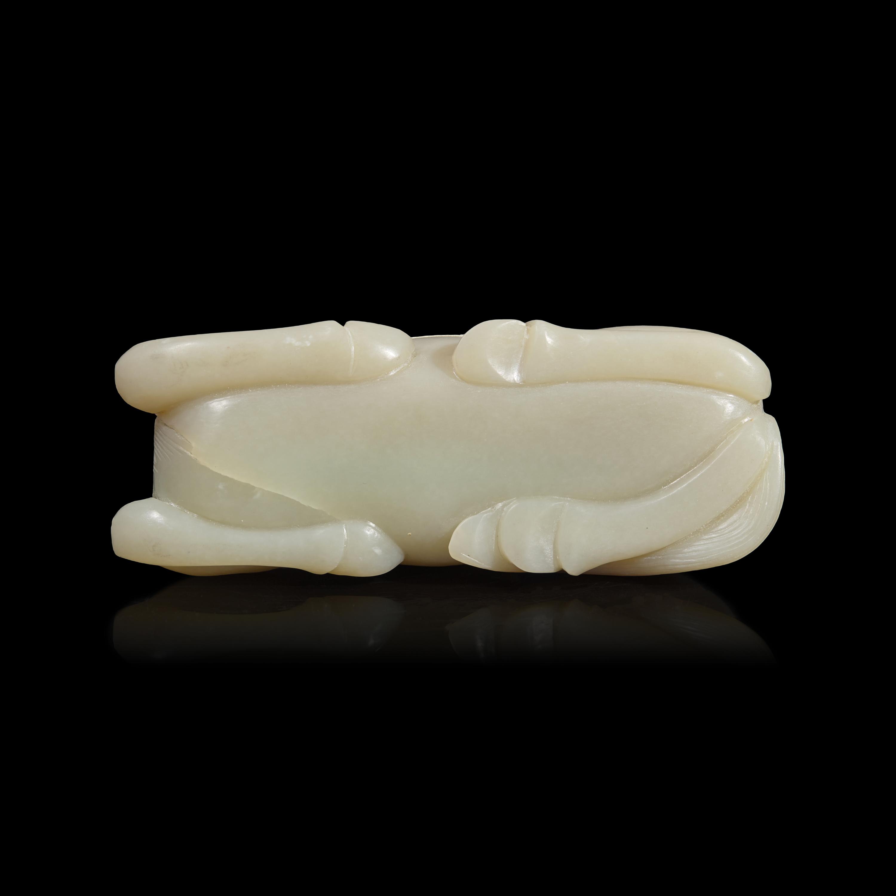 A Chinese Carved Pale Celadon Jade Horse, 20th Century 近代 青白玉臥馬