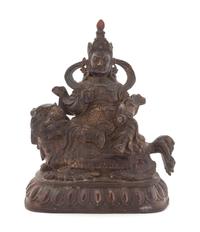 A Large Sino-Tibetan Parcel-Gilt Bronze Figure of Bodhisattva Kubera