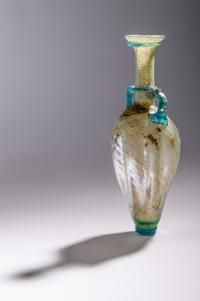 A Roman Glass Flask with Silver Iridescence