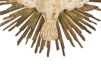 An Italian Carved and Painted Giltwood Dove on Sunburst