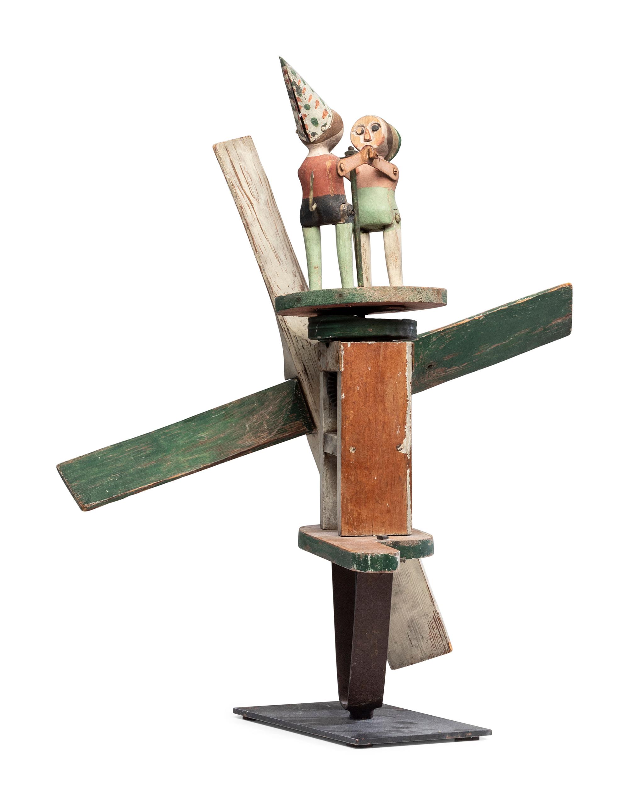 A Carved and Painted Wood Dancing Monkey Whirligig
