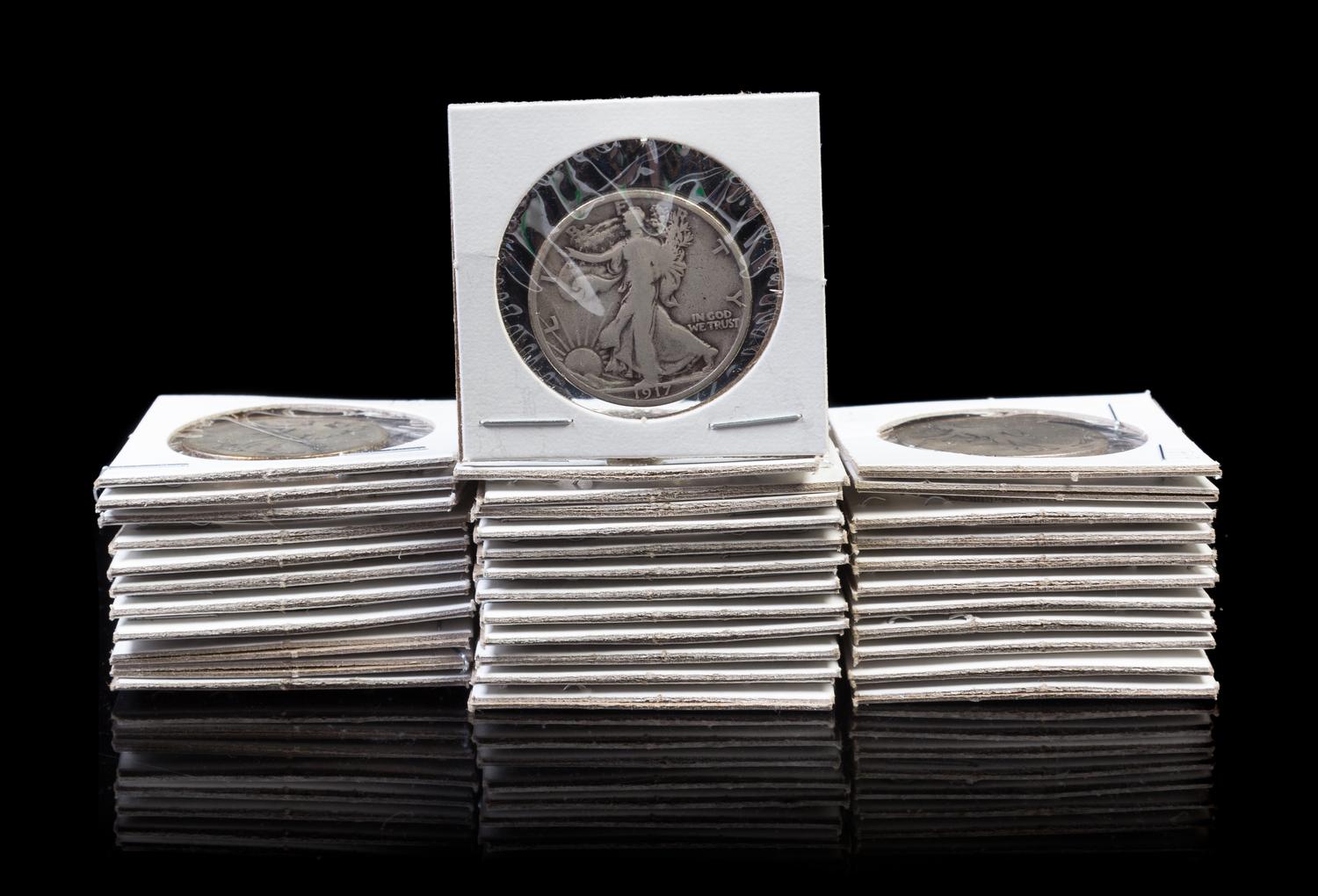 A Collection of Thirty-Five Walking Liberty Half-Dollars — Various dates