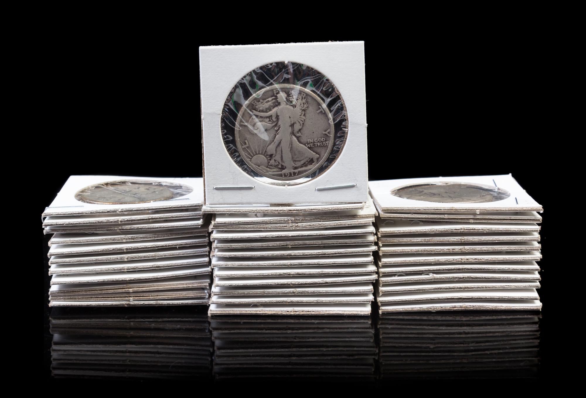 A Collection of Thirty-Five Walking Liberty Half-Dollars — Various dates