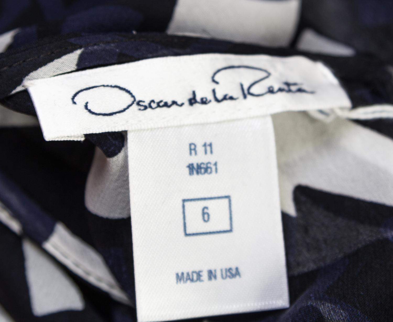 An Oscar de la Renta Black and Cream Silk Dress, Size: 6.