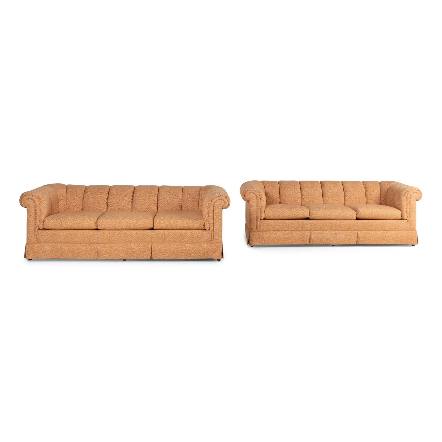 A Pair of Custom Upholstered Three-Cushion Roll-Arm Sofas