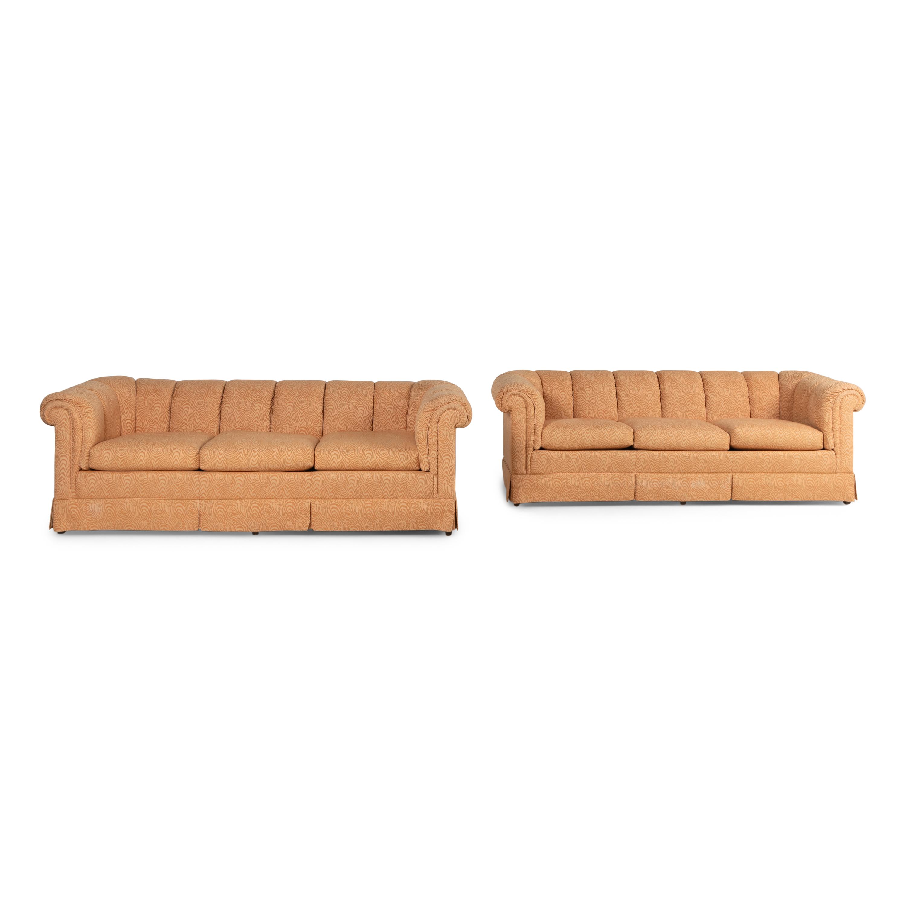 A Pair of Custom Upholstered Three-Cushion Roll-Arm Sofas