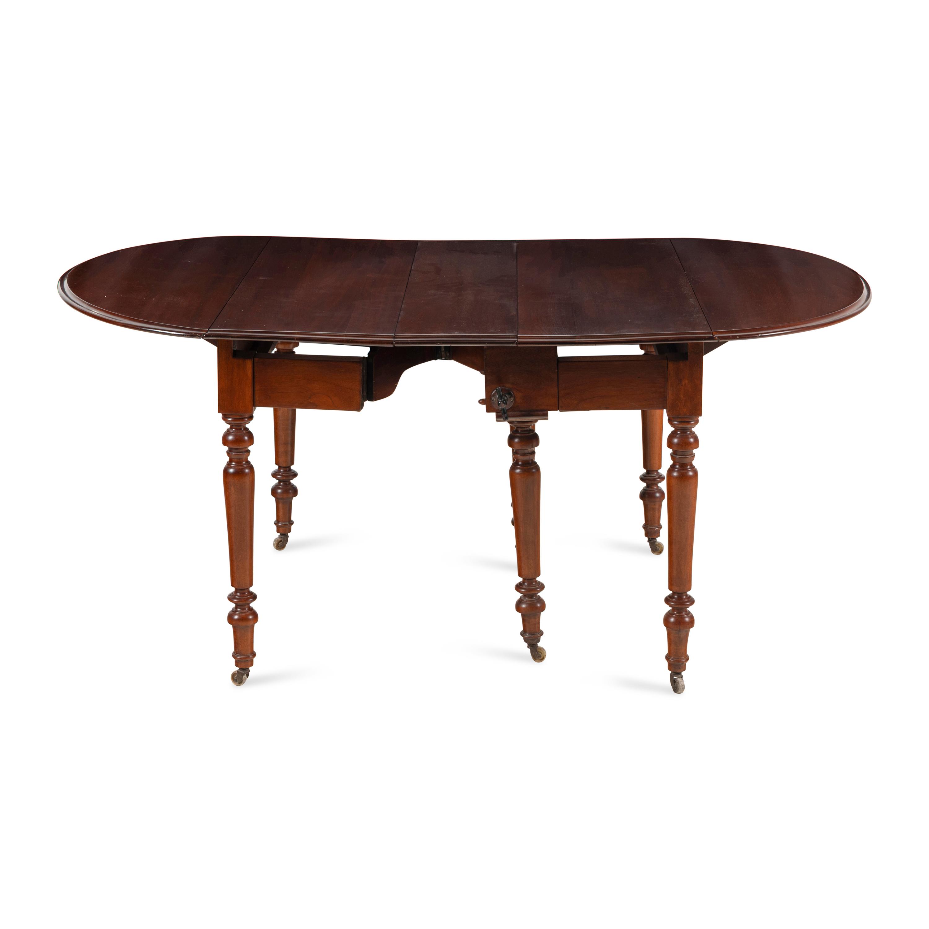 An American Walnut Mechanical Metamorphic Dining Table