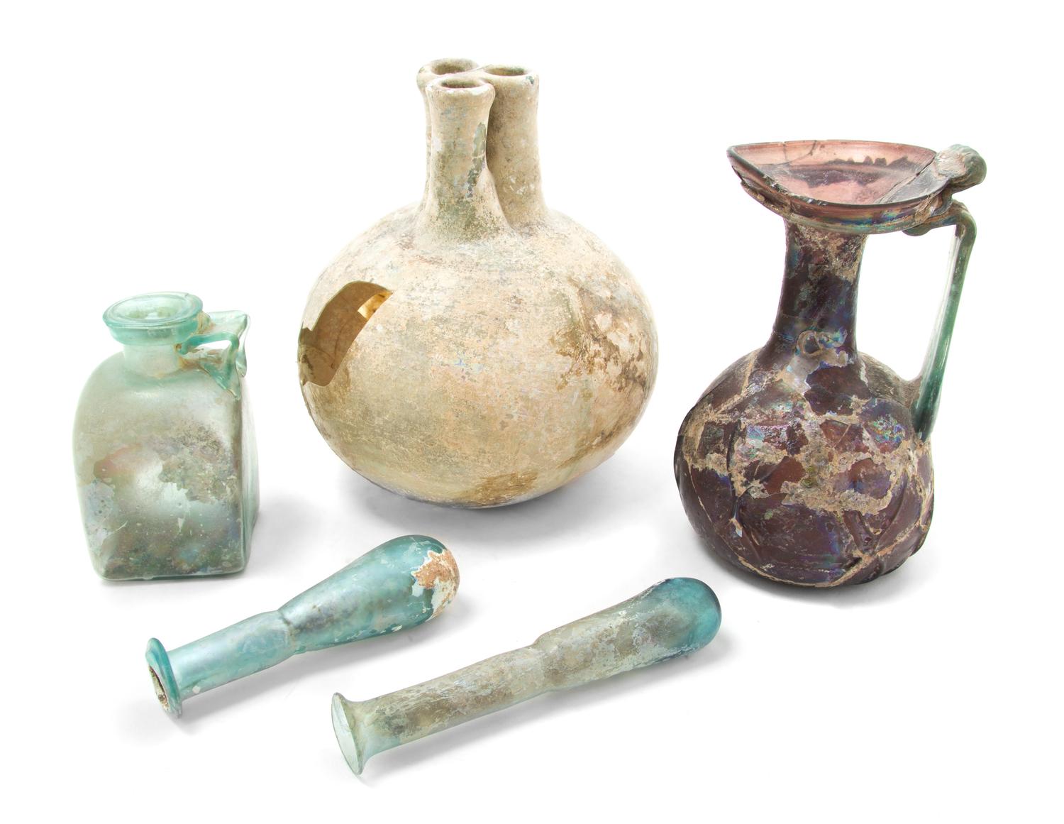 Five Roman Glass Bottles, Height of tallest 6 3/8 inches.