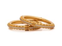 HILAT, PAIR OF DIAMOND AND HIGH KARAT GOLD BANGLE BRACLELETS