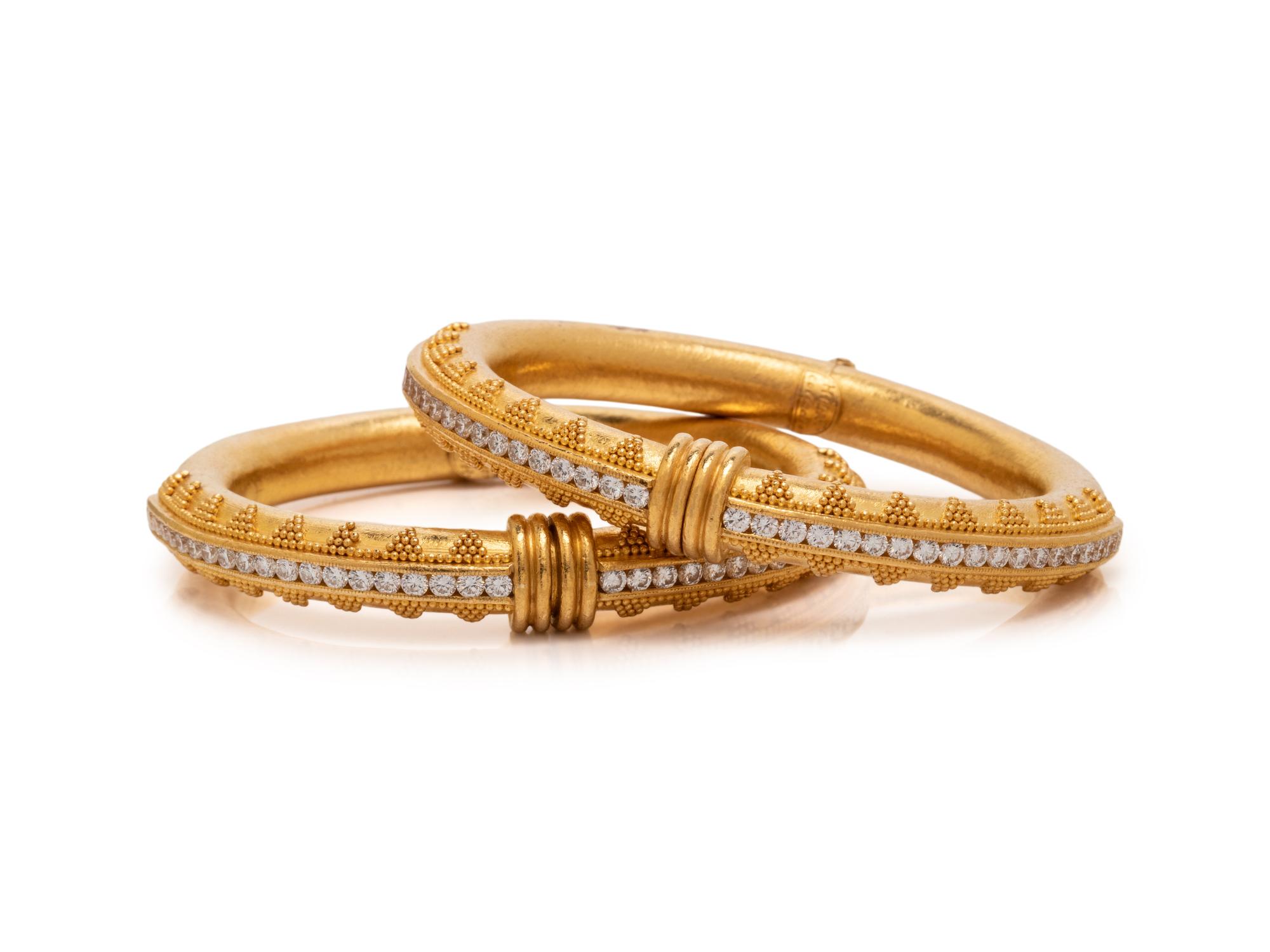 HILAT, PAIR OF DIAMOND AND HIGH KARAT GOLD BANGLE BRACLELETS