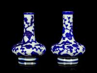 A Pair of Chinese Blue Overlay Opaque White Glass Bottle Vases