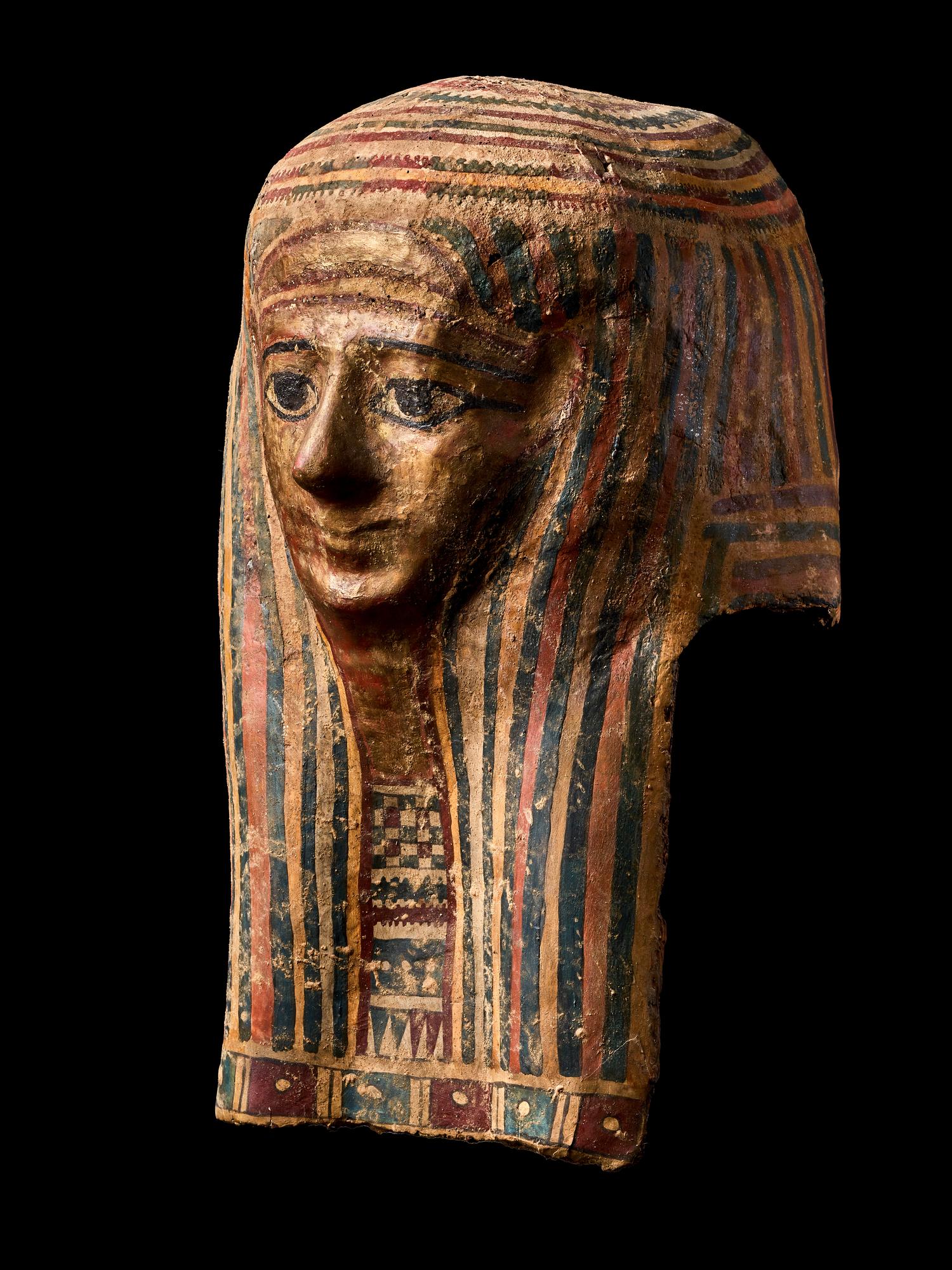 An Egyptian Cartonnage Mummy Mask