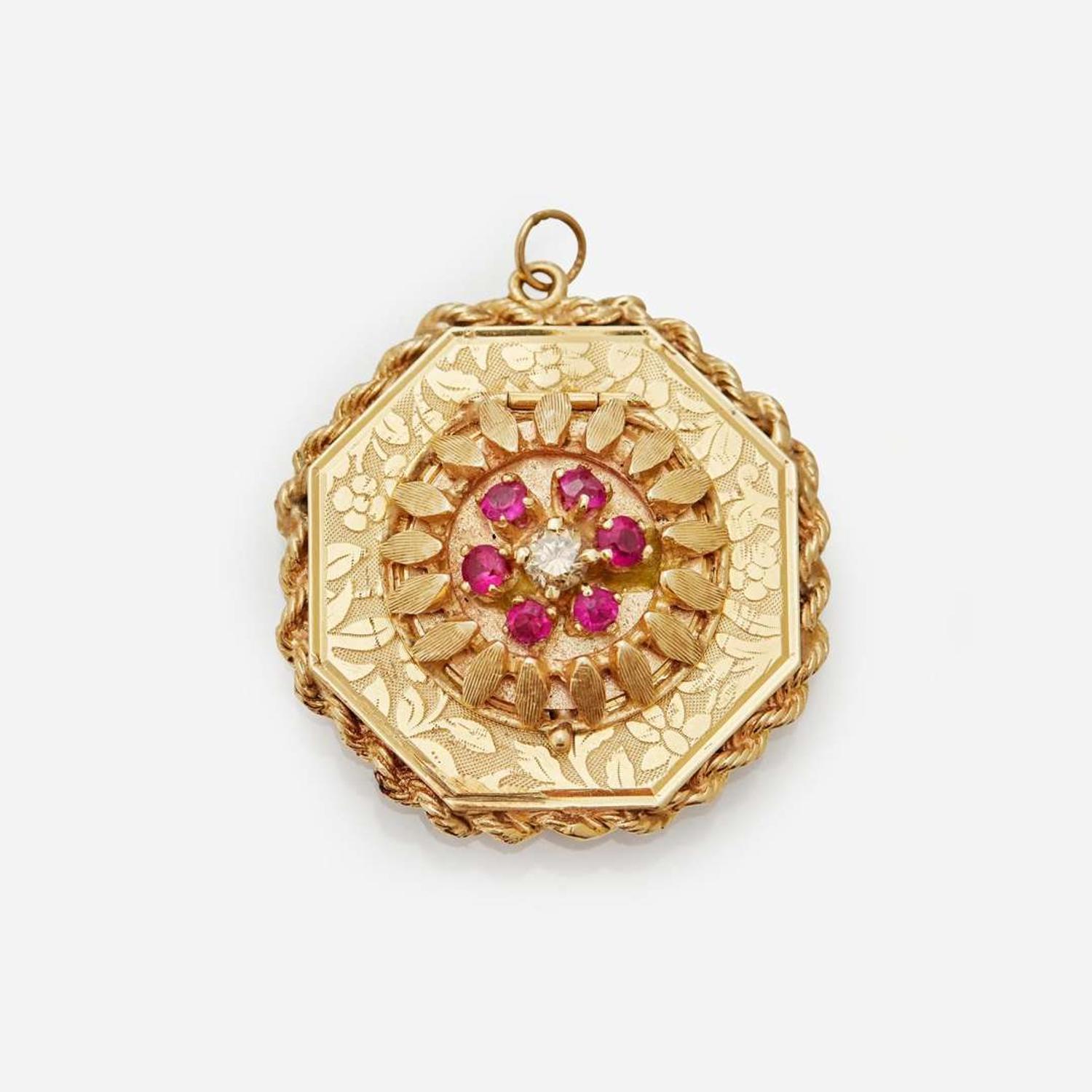 A Collection of 14K Ruby Earrings and Pendant