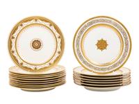 Two Sets of Gilt Porcelain Dinner Plates