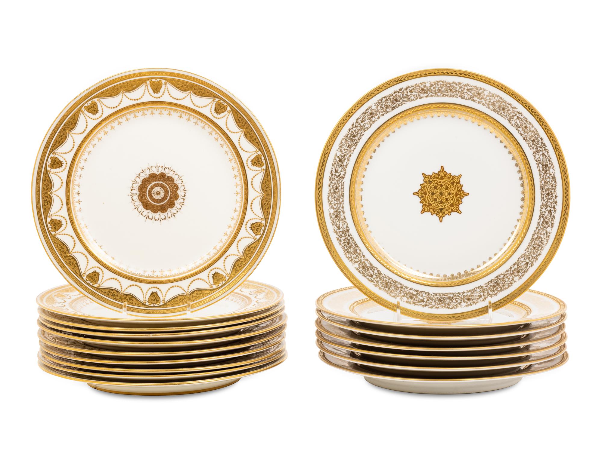 Two Sets of Gilt Porcelain Dinner Plates