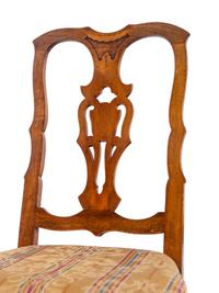 A Set of Eight French Walnut Dining Chairs