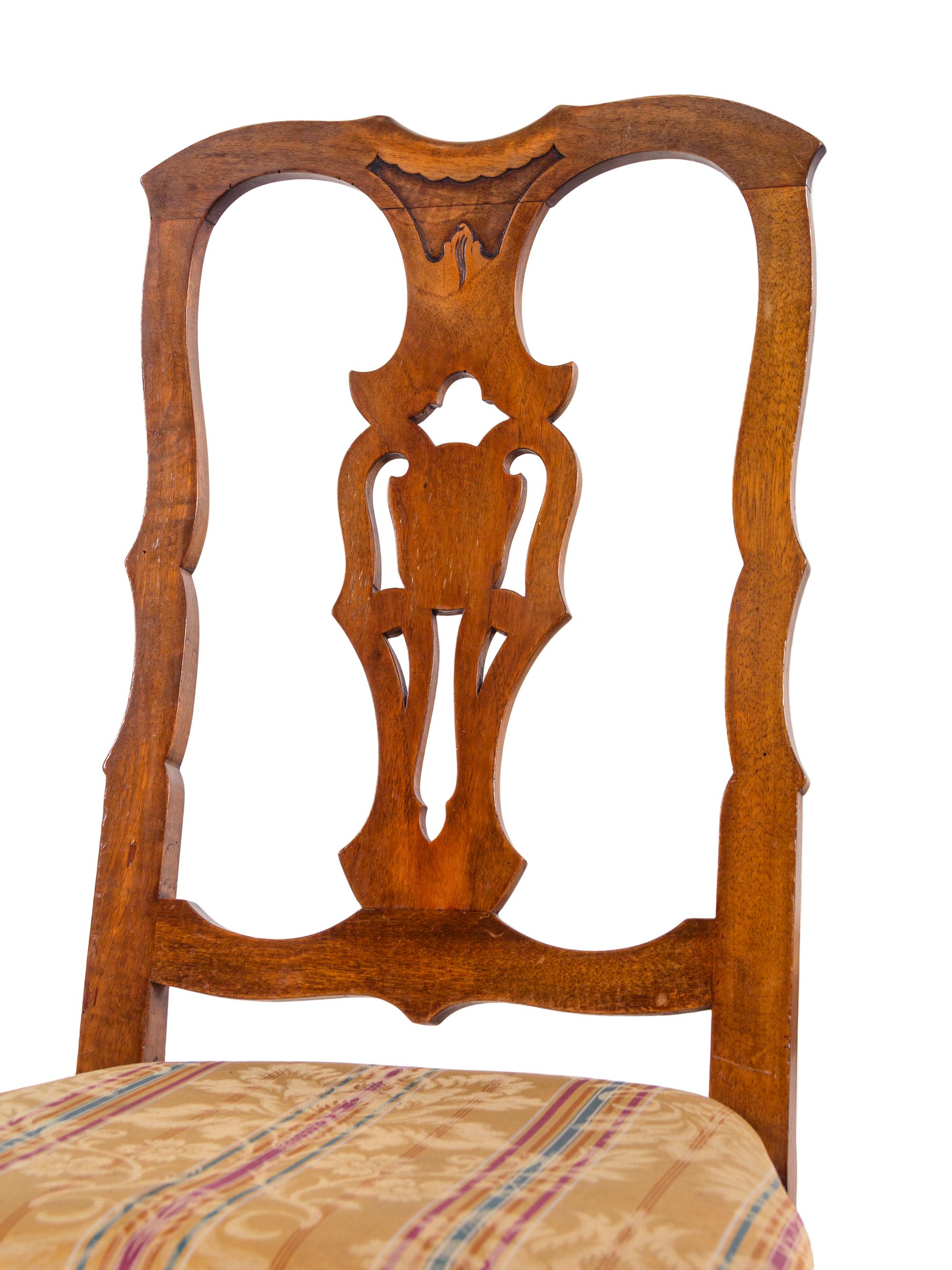 A Set of Eight French Walnut Dining Chairs