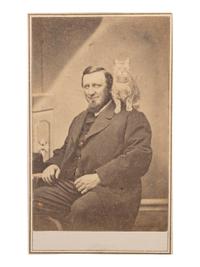 [EARLY PHOTOGRAPHY]. 6 CDVs of cats, including a portrait of a man with a feline perched on his shoulder by H. J. RODGERS, New Haven, CT.