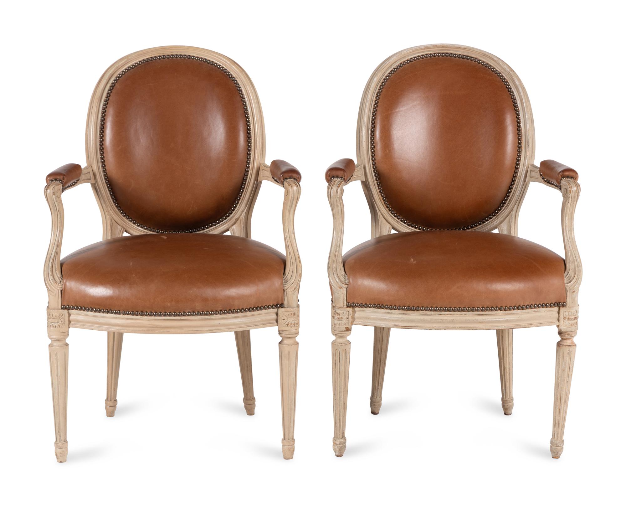 A Pair of Louis XVI Style White-Painted Fauteuils