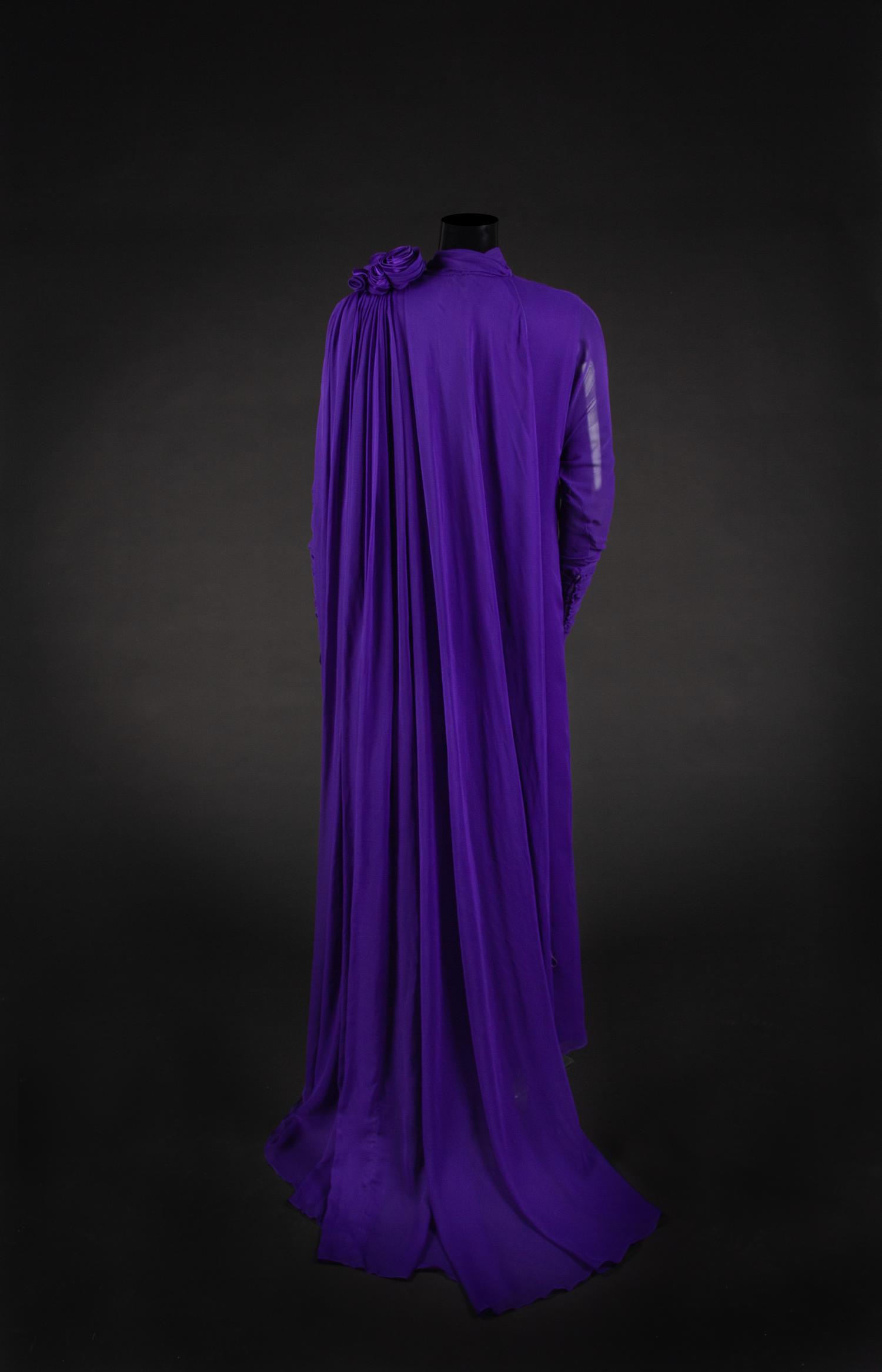 Dress, Earrings and Bag, 1987. Dress designed by Paul Zastupnevitch and made by Western Costume Company in Los Angeles — Worn by Olivia de Havilland at the Golden Globes Awards in 1987 to accept a Golden Globe Award for Best Supporting Actress in a Series, Mini Series or Motion Picture made for TV for her role in ‘Anastasia: The Mystery of Anna’.