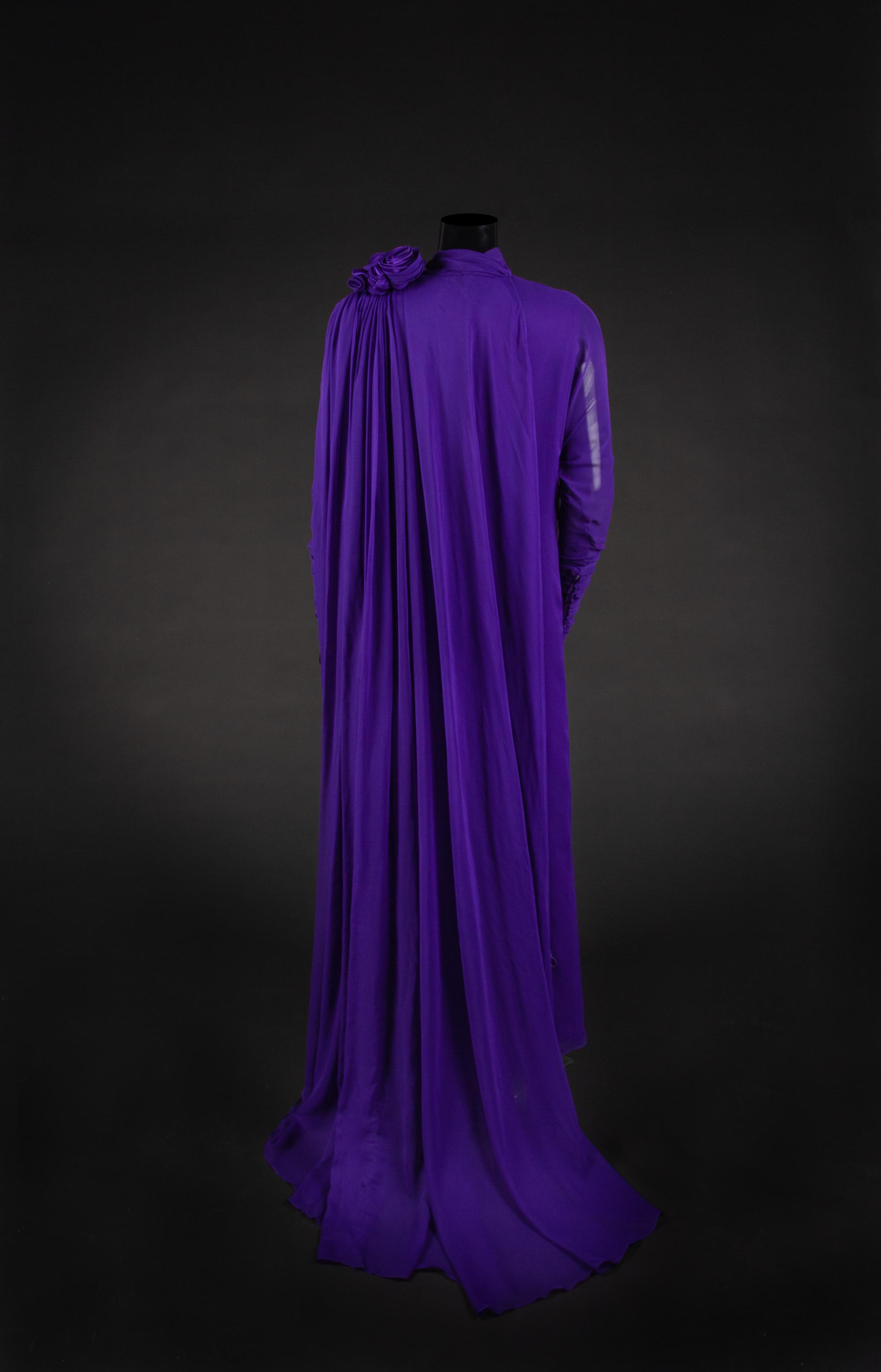 Dress, Earrings and Bag, 1987. Dress designed by Paul Zastupnevitch and made by Western Costume Company in Los Angeles — Worn by Olivia de Havilland at the Golden Globes Awards in 1987 to accept a Golden Globe Award for Best Supporting Actress in a Series, Mini Series or Motion Picture made for TV for her role in ‘Anastasia: The Mystery of Anna’.