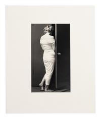 Philippe Halsman (1906-1979) Marilyn Monroe going into closet, "LIFE" cover shoot, 1952