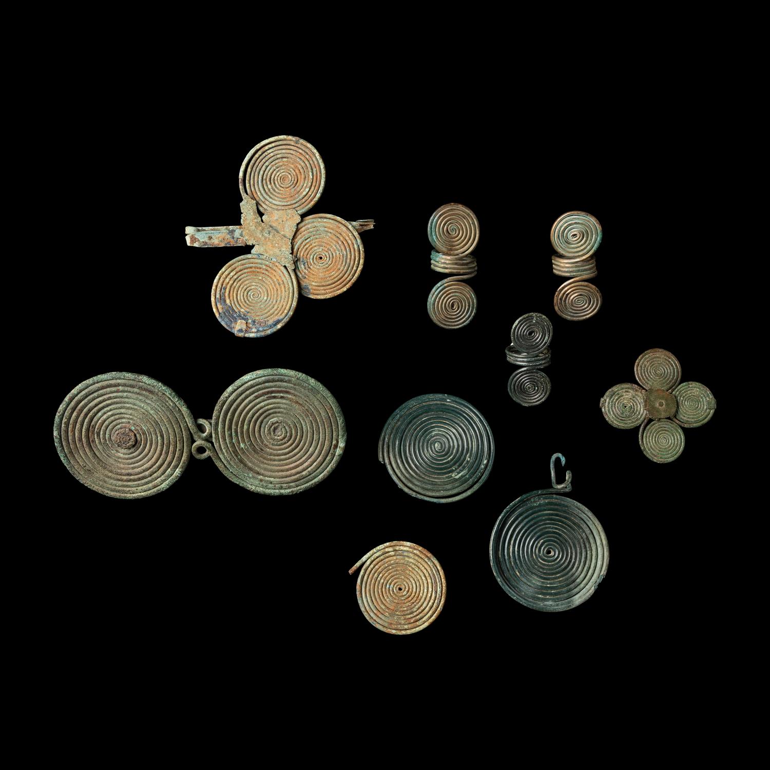 Nine European Bronze Age Spectacle Rings and Fibulae Fragments