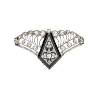 ANTIQUE, PLATINUM DIAMOND AND ONYX BROOCH